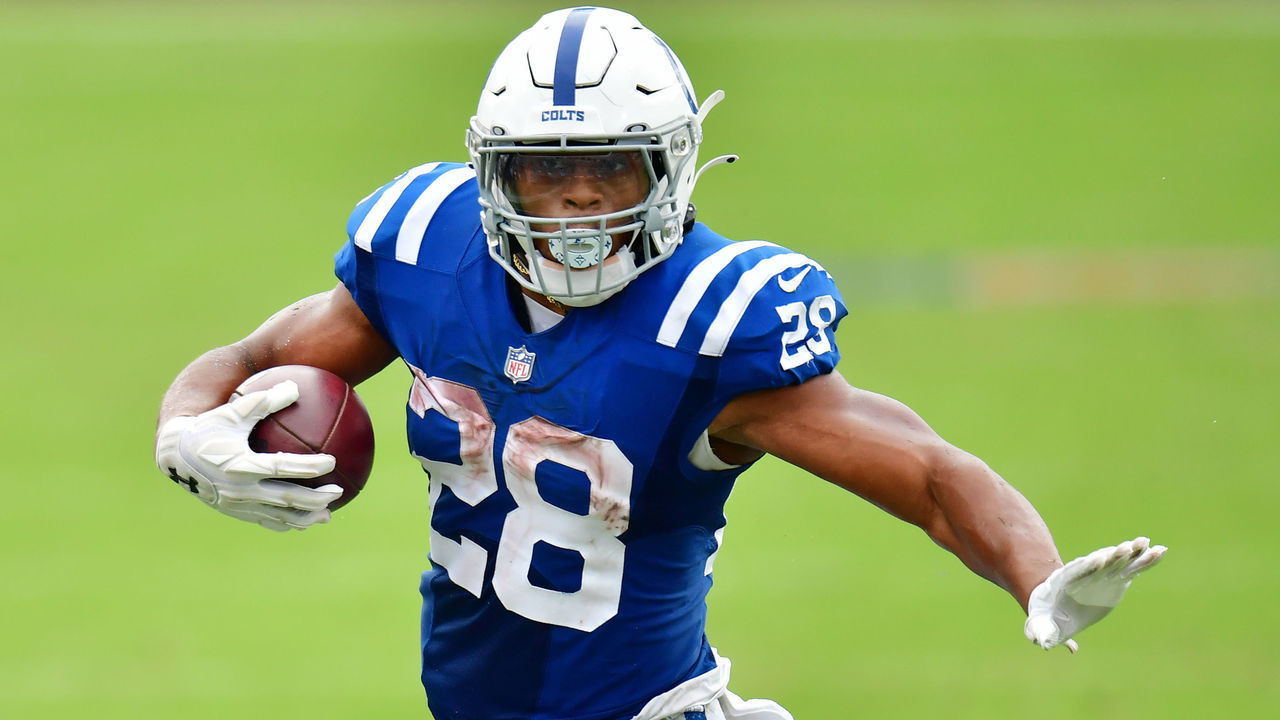 JACKSONVILLE, FLORIDA - SEPTEMBER 13: Jonathan Taylor #28 of the Indianapolis Colts runs with the ball during the fourth quarter against the Jacksonville Jaguars at TIAA Bank Field on September 13, 2020 in Jacksonville, Florida.