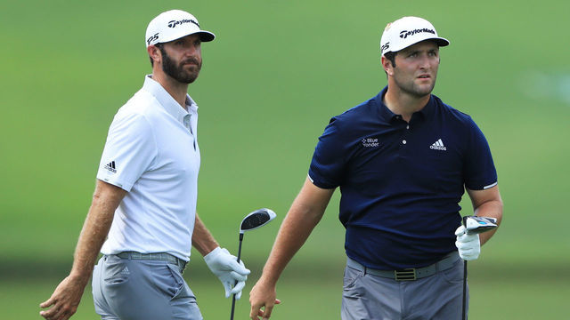 ATLANTA, GEORGIA - SEPTEMBER 05: Dustin Johnson of the United States and Jon Rahm of Spain look on from the fourth tee during the second round of the TOUR Championship at East Lake Golf Club on September 05, 2020 in Atlanta, Georgia.