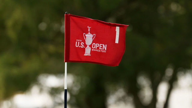 MAMARONECK, NEW YORK - SEPTEMBER 15: A detailed view of a U.S. Open flag blows in the breeze on the first green during a practice round prior to the 120th U.S. Open Championship on September 15, 2020 at Winged Foot Golf Club in Mamaroneck, New York.