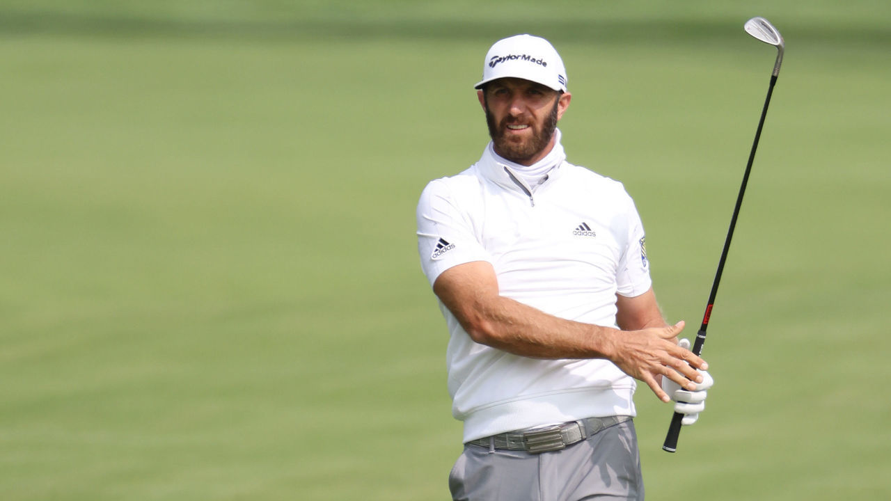 MAMARONECK, NEW YORK - SEPTEMBER 15: Dustin Johnson of the United States watches his approach shot during a practice round prior to the 120th U.S. Open Championship on September 15, 2020 at Winged Foot Golf Club in Mamaroneck, New York.