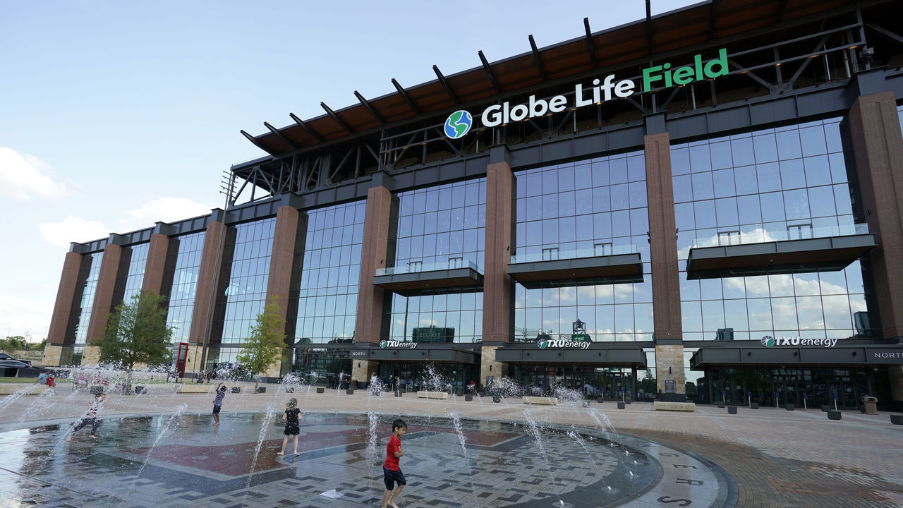 ARLINGTON, TX - JULY 24: Kids play in the fountain outside of Globe Life Field before the inaugural game between the Colorado Rockies and the Texas Rangers at Globe Life Field in Arlington on Friday, July 24, 2020 in Arlington, Texas.