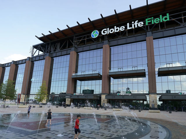 ARLINGTON, TX - JULY 24: Kids play in the fountain outside of Globe Life Field before the inaugural game between the Colorado Rockies and the Texas Rangers at Globe Life Field in Arlington on Friday, July 24, 2020 in Arlington, Texas.