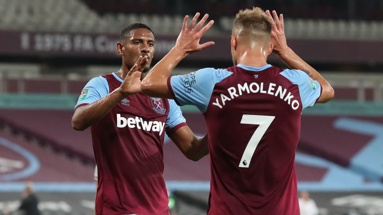 LONDON, ENGLAND - SEPTEMBER 15: Sebastien Haller of West Ham celebrates scoring the opening goal with Andriy Yarmolenko who provided the assist during the match between West Ham United and Charlton Athletic at London Stadium on September 15, 2020 in London, England.