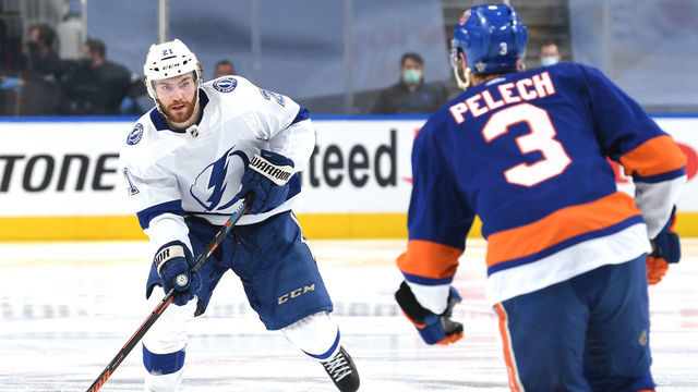 EDMONTON, ALBERTA - SEPTEMBER 13: Brayden Point #21 of the Tampa Bay Lightning skates the puck through the neutral zone in the second period of Game Four of the Eastern Conference Final of the 2020 NHL Stanley Cup Playoffs between the Tampa Bay Lightning and the New York Islanders at Rogers Place on September 13, 2020 in Edmonton, Alberta.