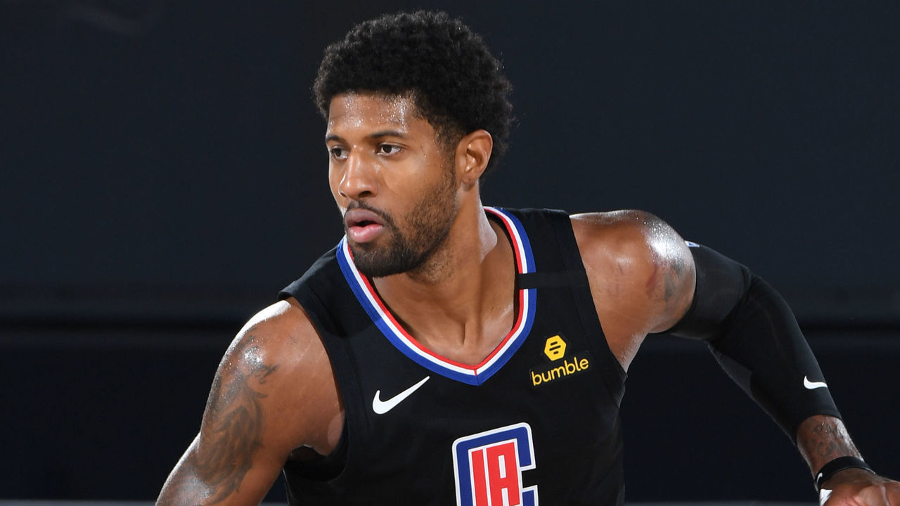 ORLANDO, FL - SEPTEMBER 15: Paul George #13 of the LA Clippers handles the ball against the Denver Nuggets during Game Seven of the Western Conference Semifinals on September 13, 2020 in Orlando, Florida at AdventHealth Arena. NOTE TO USER: User expressly acknowledges and agrees that, by downloading and/or using this Photograph, user is consenting to the terms and conditions of the Getty Images License Agreement. Mandatory Copyright Notice: Copyright 2020 NBAE