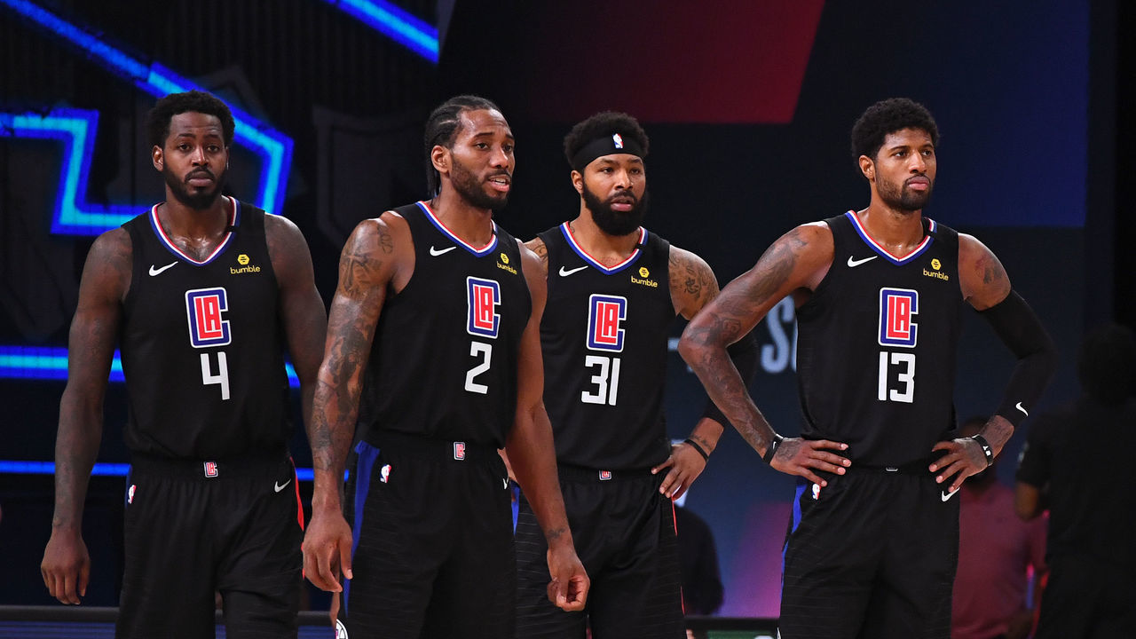 ORLANDO, FL - SEPTEMBER 15: The LA Clippers stand on the court during Game Seven of the Western Conference Semifinals of the NBA Playoffs against the Denver Nuggets on September 15, 2020 in Orlando, Florida at AdventHealth Arena. NOTE TO USER: User expressly acknowledges and agrees that, by downloading and/or using this photograph, user is consenting to the terms and conditions of the Getty Images License Agreement. Mandatory Copyright Notice: Copyright 2020 NBAE