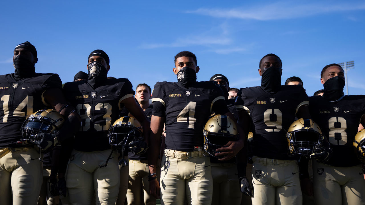 WEST POINT, NY - SEPTEMBER 12: Michael Roberts #14, Reikan Donaldson #83, Christian Anderson #4, Maurice Bellan #9, and Christian Parrish #8 of the Army Black Knights sing the United States Military Academy alma mater after winning a game against the Louisiana Monroe Warhawks at Michie Stadium on September 12, 2020 in West Point, New York.
