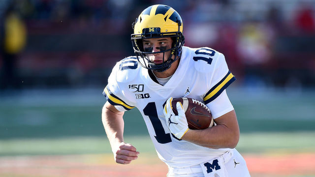 COLLEGE PARK, MD - NOVEMBER 02: Dylan McCaffrey #10 of the Michigan Wolverines runs with the ball against the Maryland Terrapins on November 2, 2019 in College Park, Maryland.