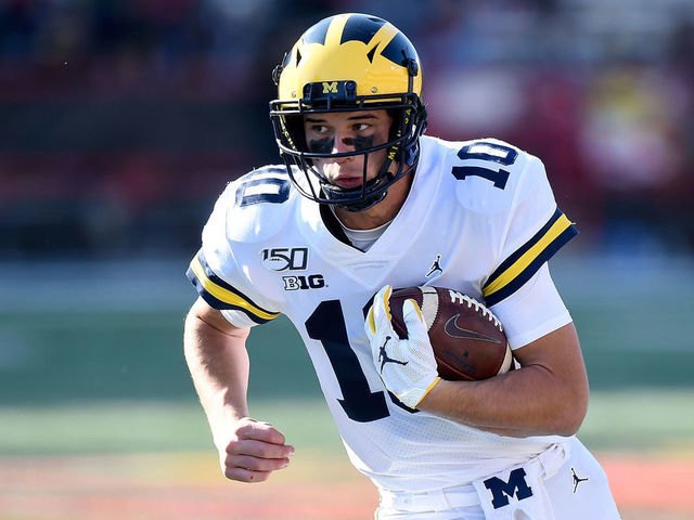 COLLEGE PARK, MD - NOVEMBER 02: Dylan McCaffrey #10 of the Michigan Wolverines runs with the ball against the Maryland Terrapins on November 2, 2019 in College Park, Maryland.
