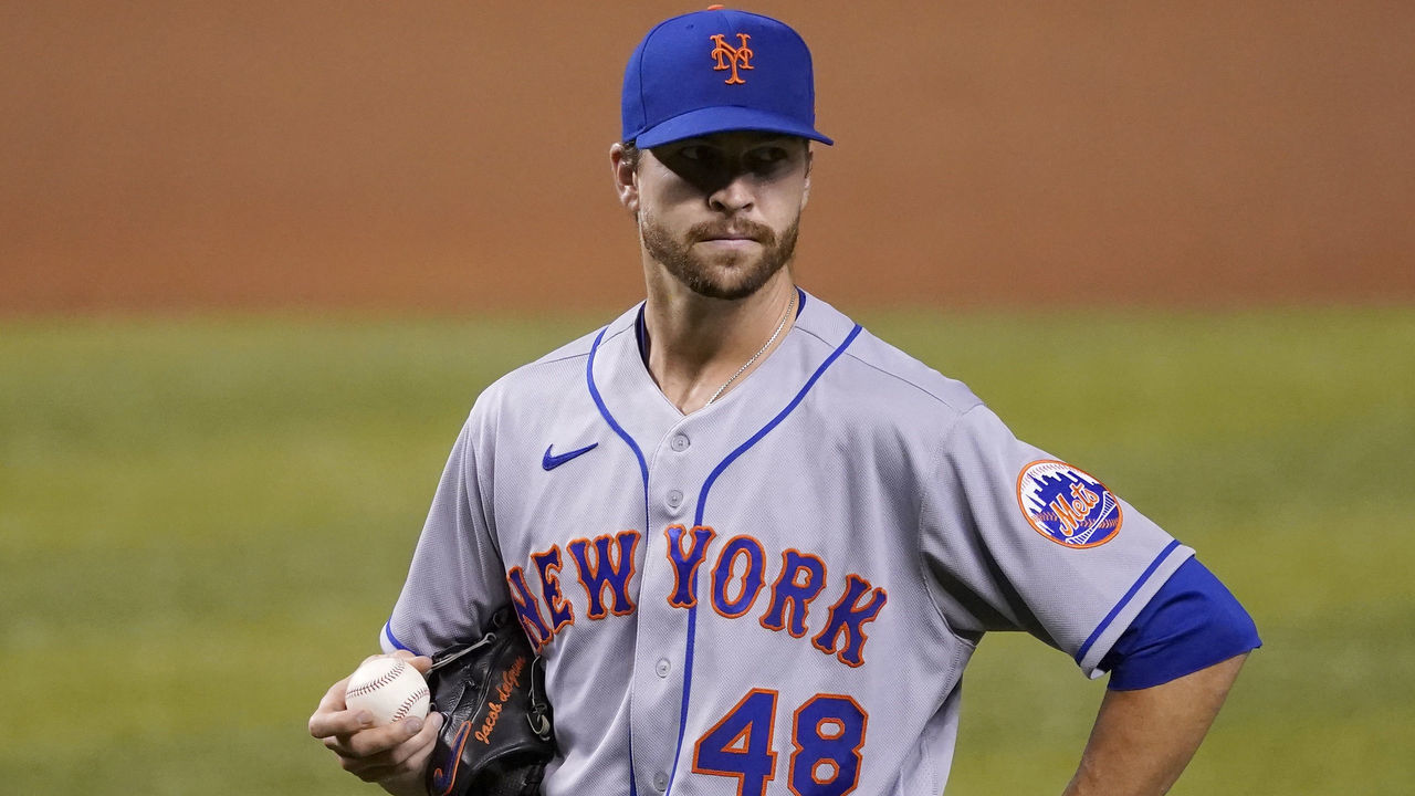 MIAMI, FLORIDA - AUGUST 19: Jacob deGrom #48 of the New York Mets looks on before delivering a pitch during the game against the Miami Marlins at Marlins Park on August 19, 2020 in Miami, Florida.