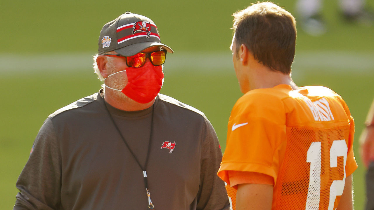 TAMPA, FLORIDA - AUGUST 28: Head coach Bruce Arians of the Tampa Bay Buccaneers talks with Tom Brady #12 during training camp at Raymond James Stadium on August 28, 2020 in Tampa, Florida.