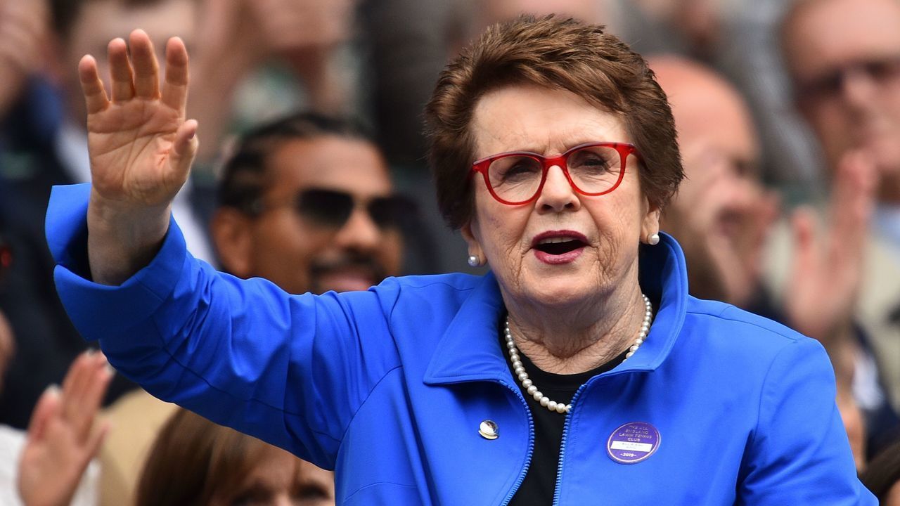 US former tennis player Billie Jean King waves as she is presented in the Royal Box on Centre Court at The All England Tennis Club in Wimbledon, southwest London, on July 6, 2019, on the sixth day of the 2019 Wimbledon Championships tennis tournament.