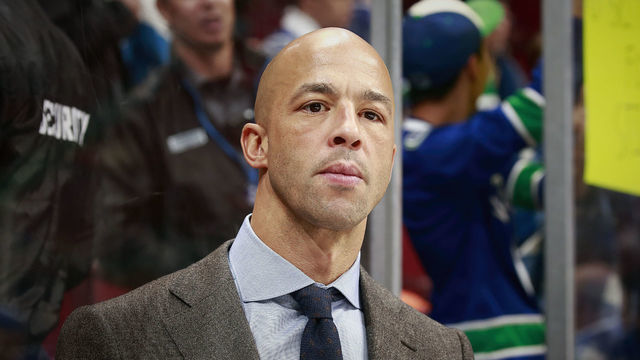 VANCOUVER, BC - OCTOBER 22: Assistant coach Manny Malhotra looks on from the bench during their NHL game against the Washington Capitals at Rogers Arena October 22, 2018 in Vancouver, British Columbia, Canada. "n