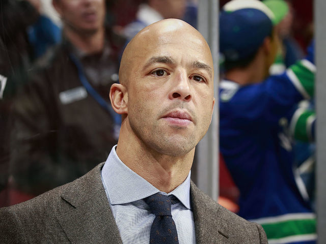 Canucks hire Malhotra as head coach