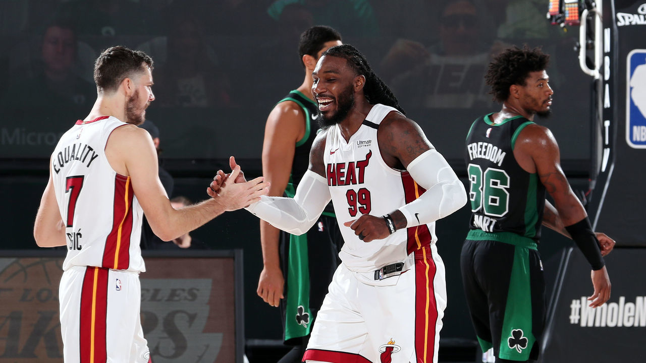 ORLANDO, FL - SEPTEMBER 17: Goran Dragic #7 of the Miami Heat and Jae Crowder #99 of the Miami Heat high five during the game against the Boston Celtics during Game Two of the Eastern Conference Finals of the NBA Playoffs on September 17, 2020 at The AdventHealth Arena at ESPN Wide World Of Sports Complex in Orlando, Florida. NOTE TO USER: User expressly acknowledges and agrees that, by downloading and/or using this Photograph, user is consenting to the terms and conditions of the Getty Images License Agreement. Mandatory Copyright Notice: Copyright 2020 NBAE