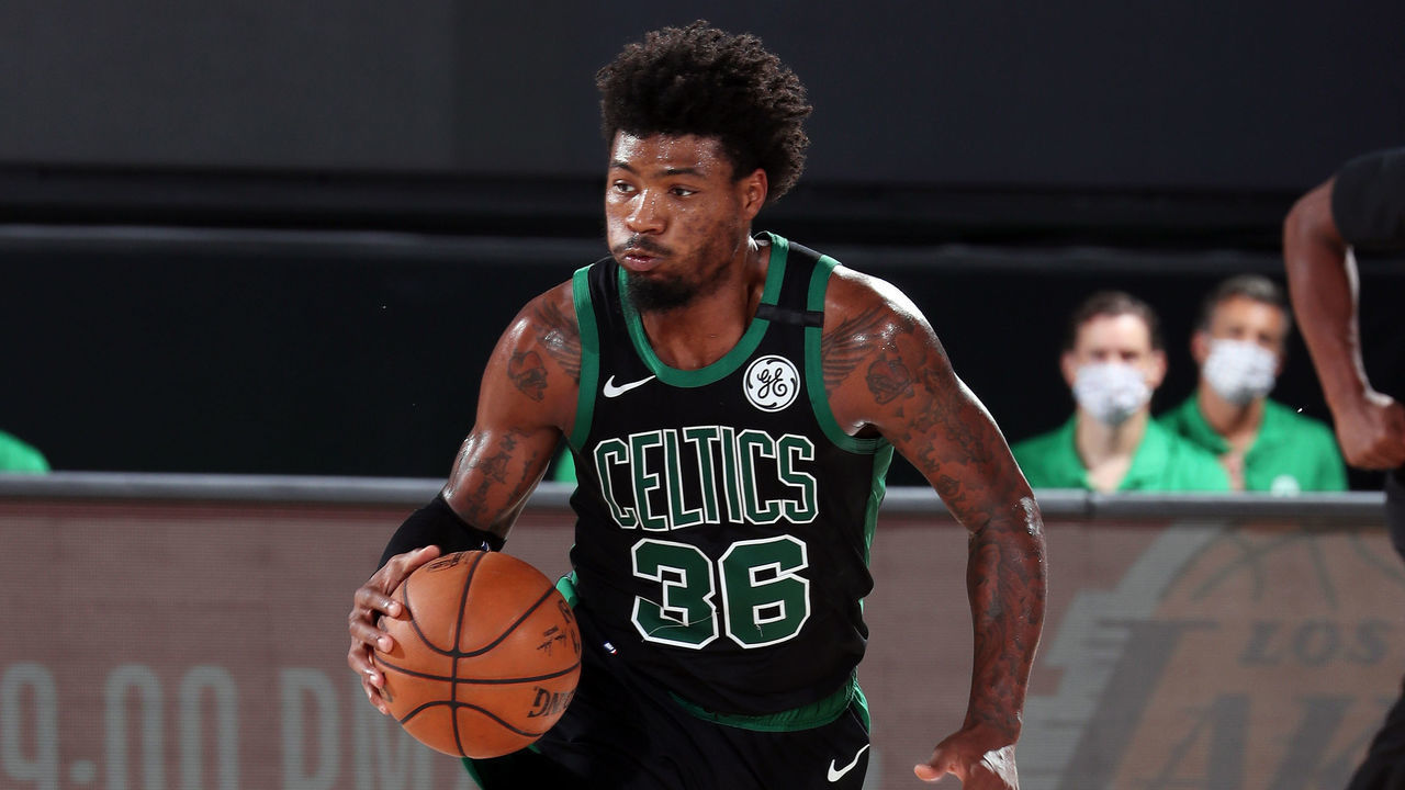 ORLANDO, FL - SEPTEMBER 17: Marcus Smart #36 of the Boston Celtics handles the ball during the game against the Miami Heat during Game Two of the Eastern Conference Finals of the NBA Playoffs on September 17, 2020 at The AdventHealth Arena at ESPN Wide World Of Sports Complex in Orlando, Florida. NOTE TO USER: User expressly acknowledges and agrees that, by downloading and/or using this Photograph, user is consenting to the terms and conditions of the Getty Images License Agreement. Mandatory Copyright Notice: Copyright 2020 NBAE