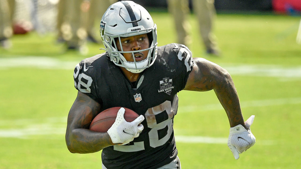 CHARLOTTE, NORTH CAROLINA - SEPTEMBER 13: Josh Jacobs #28 of the Las Vegas Raiders runs against the Carolina Panthers during their game at Bank of America Stadium on September 13, 2020 in Charlotte, North Carolina. Las Vegas won 34-30.