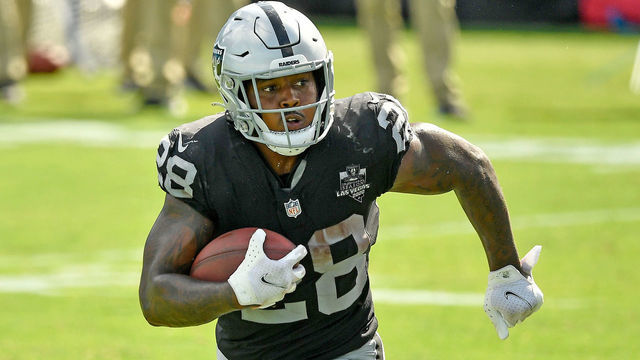 CHARLOTTE, NORTH CAROLINA - SEPTEMBER 13: Josh Jacobs #28 of the Las Vegas Raiders runs against the Carolina Panthers during their game at Bank of America Stadium on September 13, 2020 in Charlotte, North Carolina. Las Vegas won 34-30.