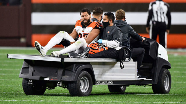 CLEVELAND, OH - SEPTEMBER 17: C.J. Uzomah #87 of the Cincinnati Bengals is carted off the field after being injured in the fourth quarter against the Cleveland Browns at FirstEnergy Stadium on September 17, 2020 in Cleveland, Ohio. Cleveland defeated Cincinnati 35-30.