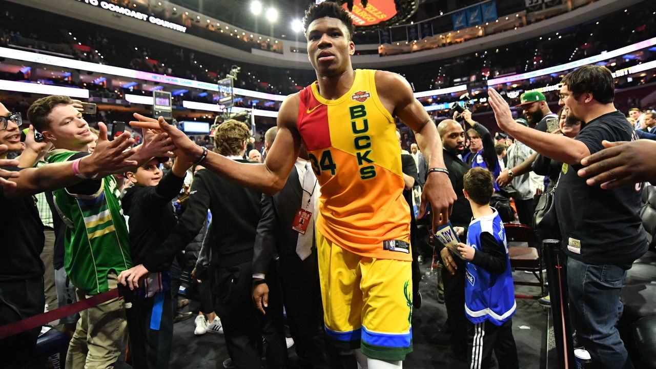 PHILADELPHIA, PA - APRIL 4: Giannis Antetokounmpo #34 of the Milwaukee Bucks high fives fans after the game against the Philadelphia 76ers on April 4, 2019 at the Wells Fargo Center in Philadelphia, Pennsylvania NOTE TO USER: User expressly acknowledges and agrees that, by downloading and/or using this Photograph, user is consenting to the terms and conditions of the Getty Images License Agreement. Mandatory Copyright Notice: Copyright 2019 NBAE