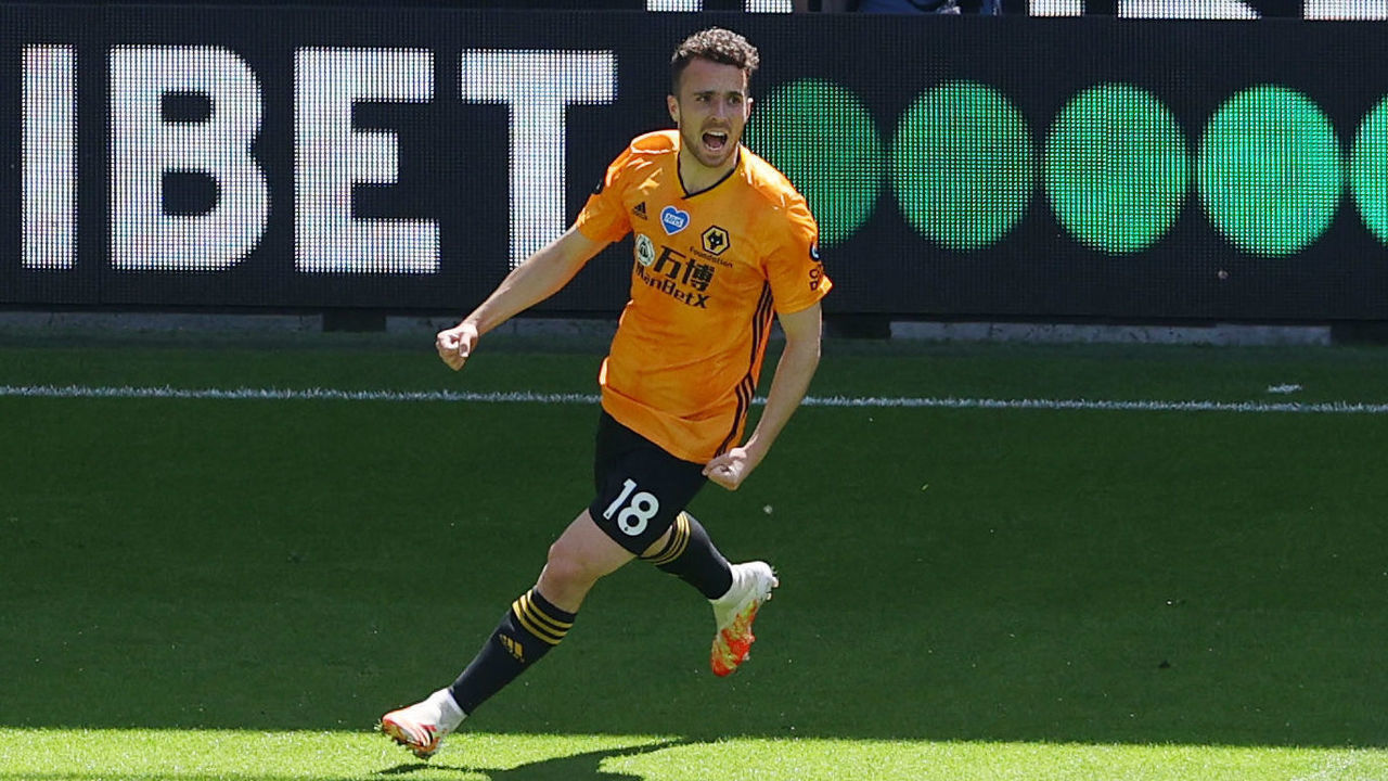 Wolverhampton Wanderers' Portuguese midfielder Diogo Jota celebrates after scoring their third goal during the English Premier League football match between Wolverhampton Wanderers and Everton at the Molineux stadium in Wolverhampton, central England on July 12, 2020.