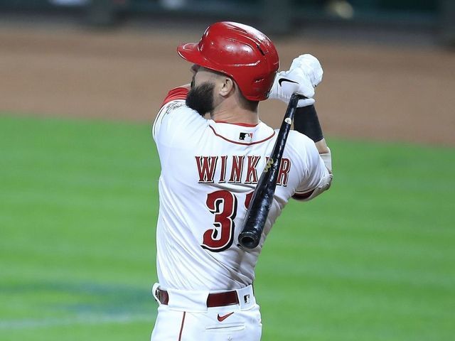 Cincinnati Reds' Jesse Winker (33) bats during the first inning of