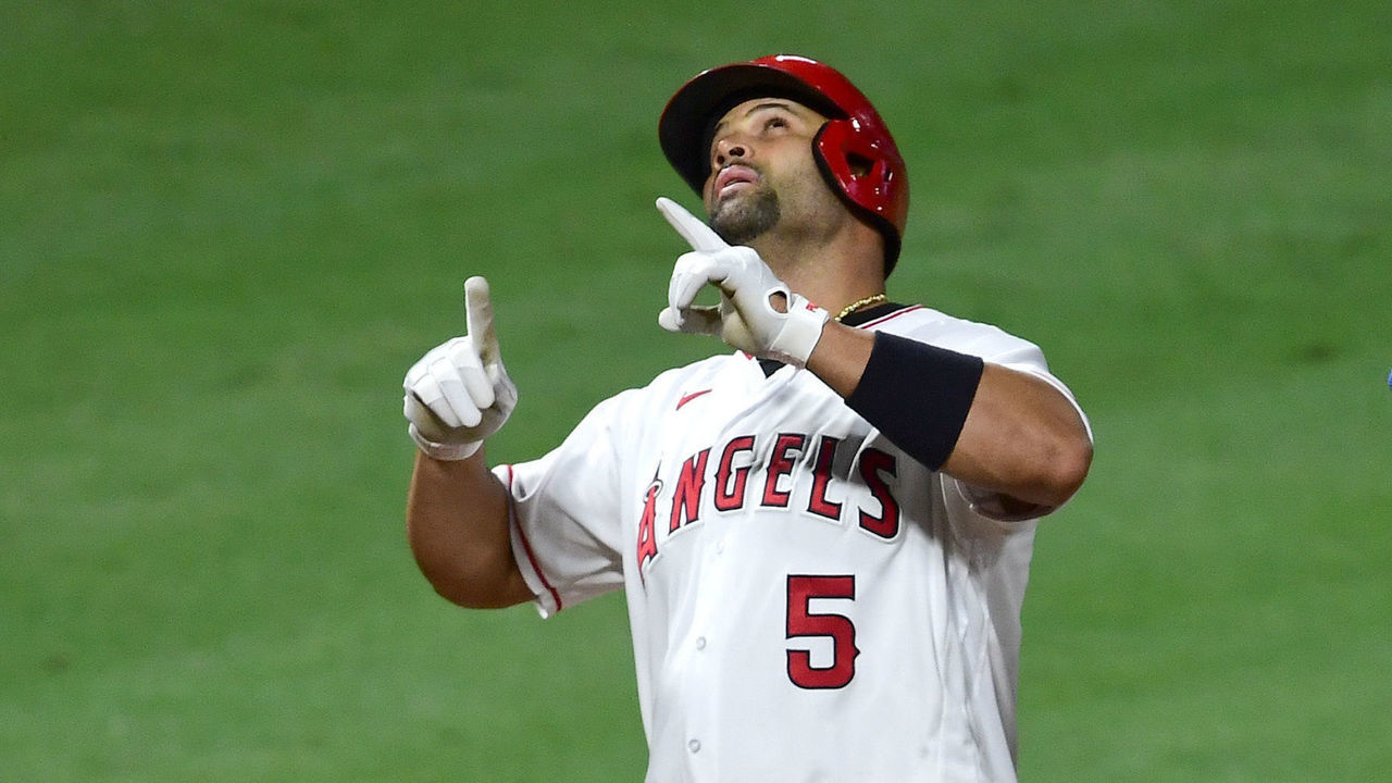 ANAHEIM, CA - SEPTEMBER 18: Albert Pujols #5 of the Los Angeles Angels crosses the plate after hitting his 661st career home run, passing Hall of Famer and San Francisco Giants legend Willie Mays for fifth place on baseball's all-time home run list in the fifth inning of the game against the Texas Rangers at Angel Stadium of Anaheim on September 18, 2020 in Anaheim, California.