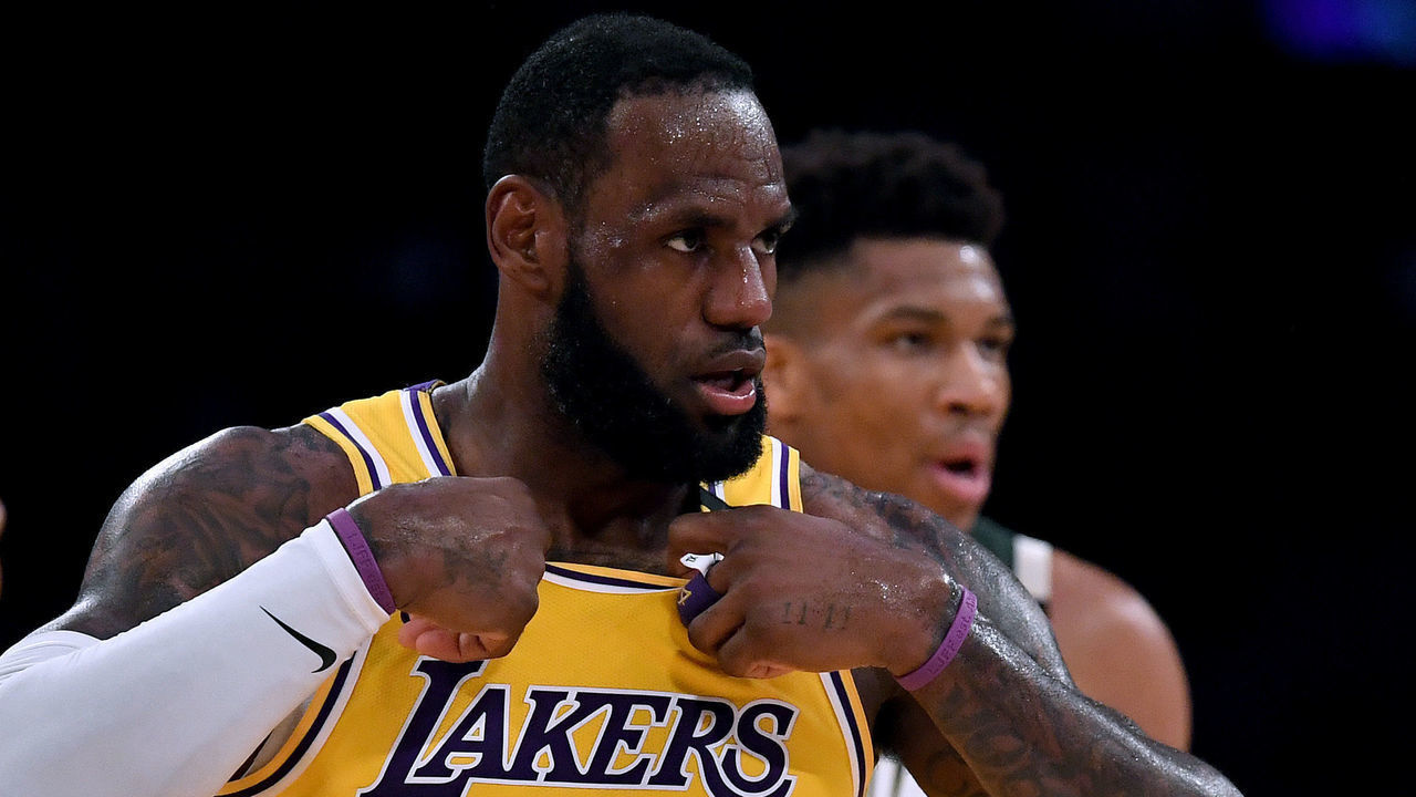 LOS ANGELES, CALIFORNIA - MARCH 06: LeBron James #23 of the Los Angeles Lakers reacts after his basket in front of Giannis Antetokounmpo #34 of the Milwaukee Bucks at Staples Center on March 06, 2020 in Los Angeles, California.