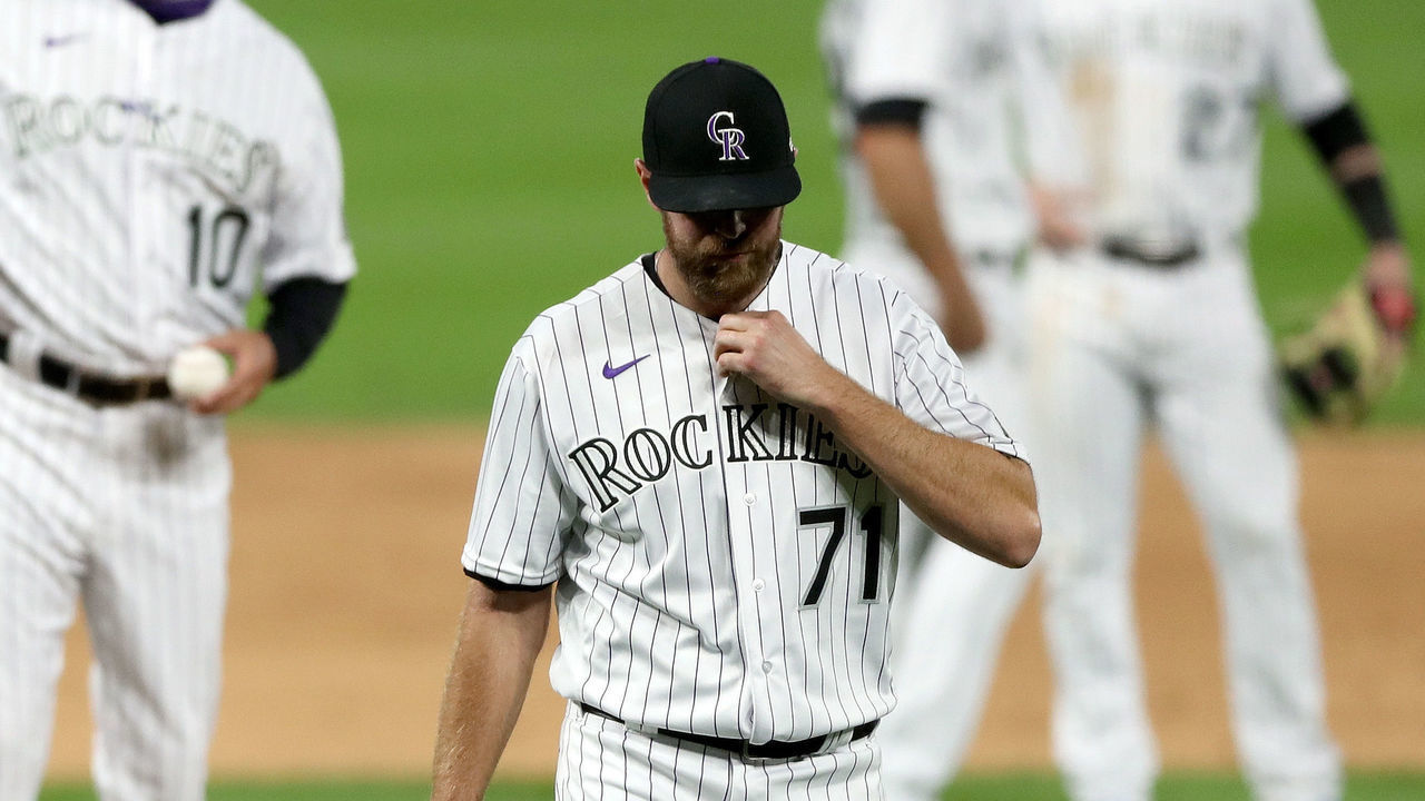 DENVER, COLORADO - JULY 31: Pitcher Wade Davis #71 of the Colorado Rockies leaves the game in the ninth inning against the San Diego Padres at Coors Field on July 31, 2020 in Denver, Colorado.