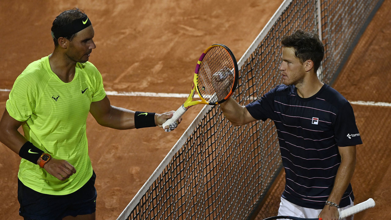 ROME, ITALY - SEPTEMBER 19: Rafael Nadal of Spain and Diego Schwartzman of Argentina interact at the net after their quarter-final match during day six of the Internazionali BNL d'Italia at Foro Italico on September 19, 2020 in Rome, Italy.