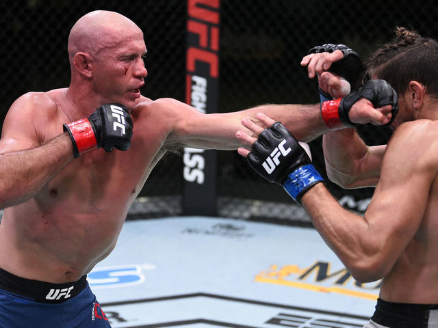 LAS VEGAS, NEVADA - SEPTEMBER 19: (L-R) Donald Cerrone punches Niko Price in their welterweight bout during the UFC Fight Night event at UFC APEX on September 19, 2020 in Las Vegas, Nevada.
