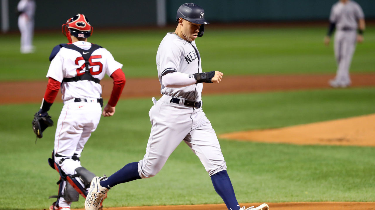 BOSTON, MASSACHUSETTS - SEPTEMBER 19: Aaron Judge #99 of the New York Yankees scores a run against the Boston Red Sox during the first inning at Fenway Park on September 19, 2020 in Boston, Massachusetts.