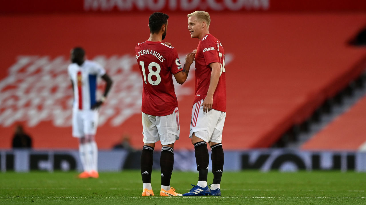 MANCHESTER, ENGLAND - SEPTEMBER 19: Donny Van De Beek of Manchester United speaks with Bruno Fernandes of Manchester United during the Premier League match between Manchester United and Crystal Palace at Old Trafford on September 19, 2020 in Manchester, England.