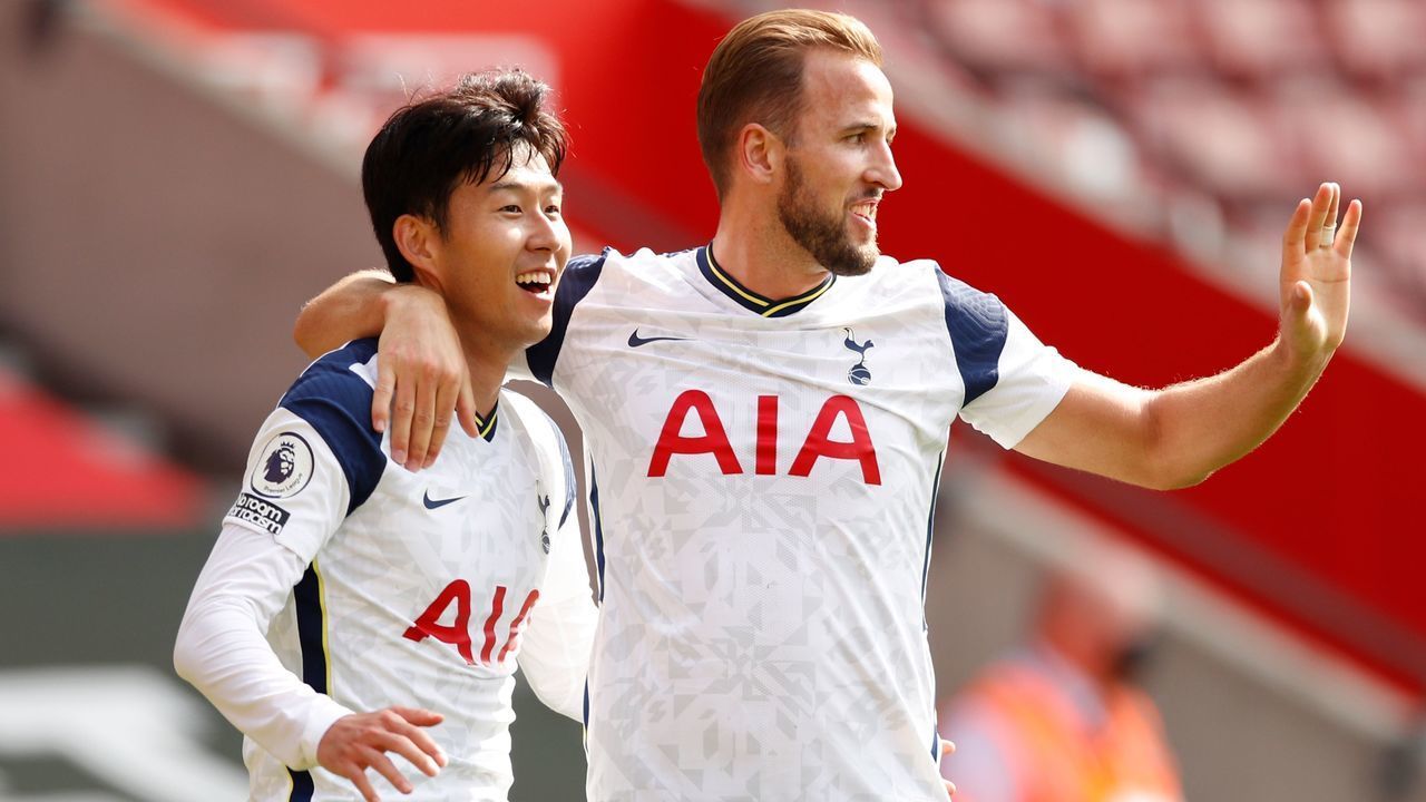 Tottenham Hotspur's South Korean striker Son Heung-Min celebrates with Tottenham Hotspur's English striker Harry Kane (R) after scoring his and their third goal during the English Premier League football match between Southampton and Tottenham Hotspur at St Mary's Stadium in Southampton, southern England on September 20, 2020.