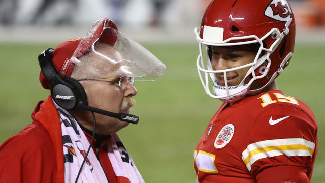 KANSAS CITY, MISSOURI - SEPTEMBER 10: Patrick Mahomes #15 of the Kansas City Chiefs smiles at head coach Andy Reid during the fourth quarter against the Houston Texans at Arrowhead Stadium on September 10, 2020 in Kansas City, Missouri.