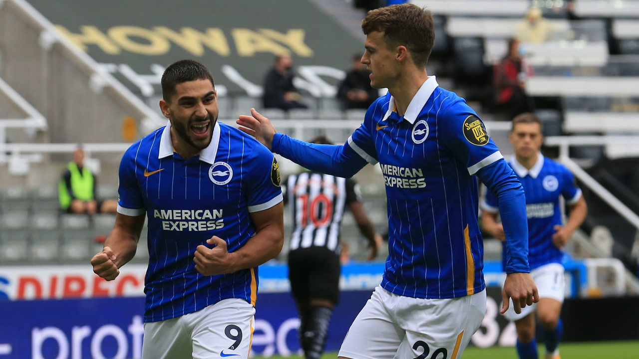 Brighton's French striker Neal Maupay (L) celebrates after scoring a penalty during the English Premier League football match between Newcastle United and Brighton and Hove Albion at St James' Park in Newcastle upon Tyne, north-east England on September 20, 2020.