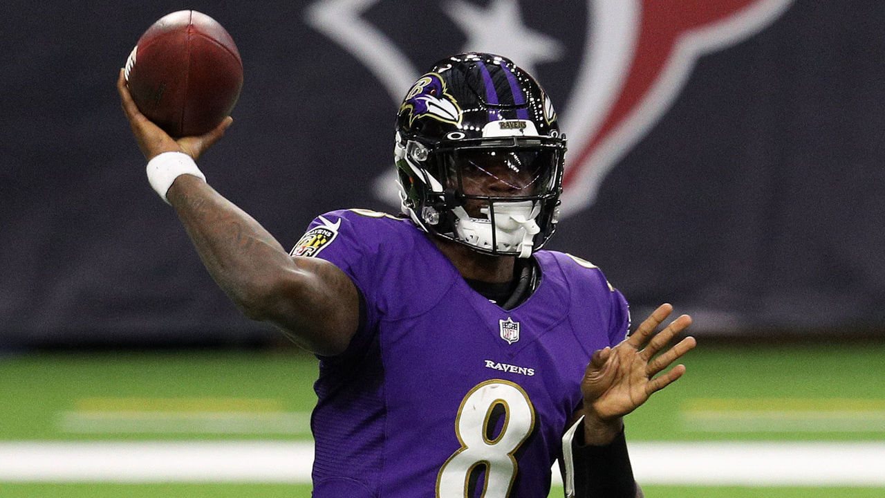 HOUSTON, TEXAS - SEPTEMBER 20: Lamar Jackson #8 of the Baltimore Ravens passes against the Houston Texans during the first half at NRG Stadium on September 20, 2020 in Houston, Texas.