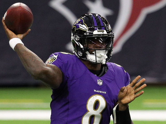 HOUSTON, TEXAS - SEPTEMBER 20: Lamar Jackson #8 of the Baltimore Ravens passes against the Houston Texans during the first half at NRG Stadium on September 20, 2020 in Houston, Texas.