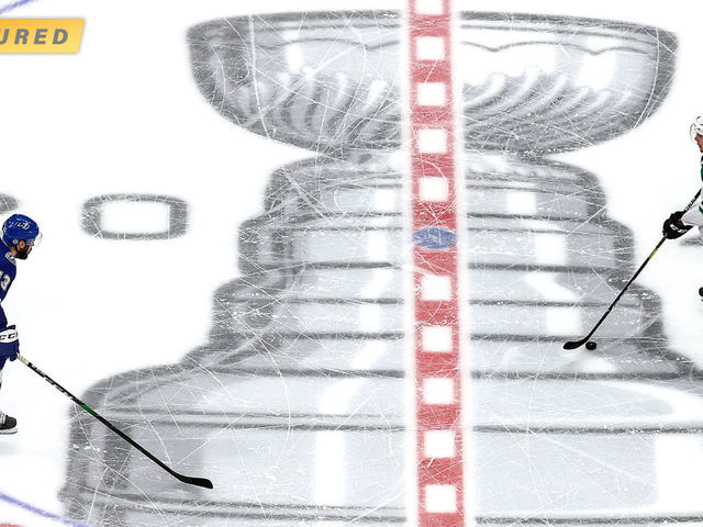 How hockey's most prolific photographer works his magic above the bubble