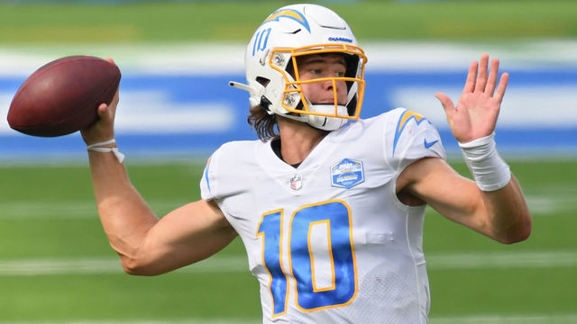 INGLEWOOD, CALIFORNIA - SEPTEMBER 20: Quarterback Justin Herbert #10 of the Los Angeles Chargers throws a pass against the Kansas City Chiefs during the first half at SoFi Stadium on September 20, 2020 in Inglewood, California.