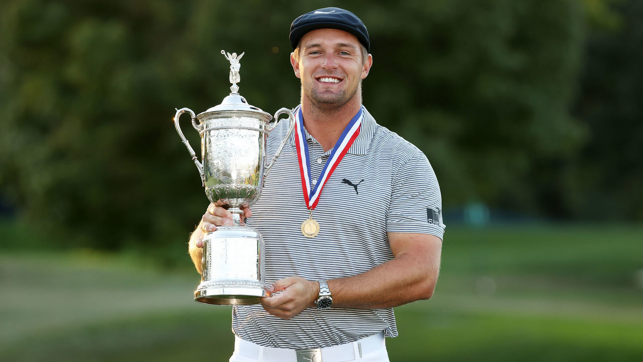 MAMARONECK, NEW YORK - SEPTEMBER 20: Bryson DeChambeau of the United States celebrates with the championship trophy after winning the 120th U.S. Open Championship on September 20, 2020 at Winged Foot Golf Club in Mamaroneck, New York.