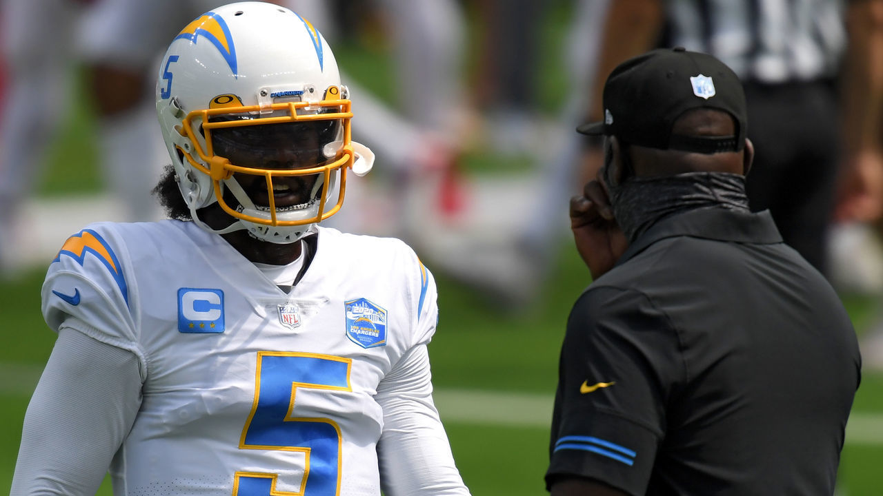 INGLEWOOD, CALIFORNIA - SEPTEMBER 20: Quarterback Tyrod Taylor #5 of the Los Angeles Chargers and Head coach Anthony Lynn of the Los Angeles Chargers talk before playing against the Kansas City Chiefs at SoFi Stadium on September 20, 2020 in Inglewood, California.