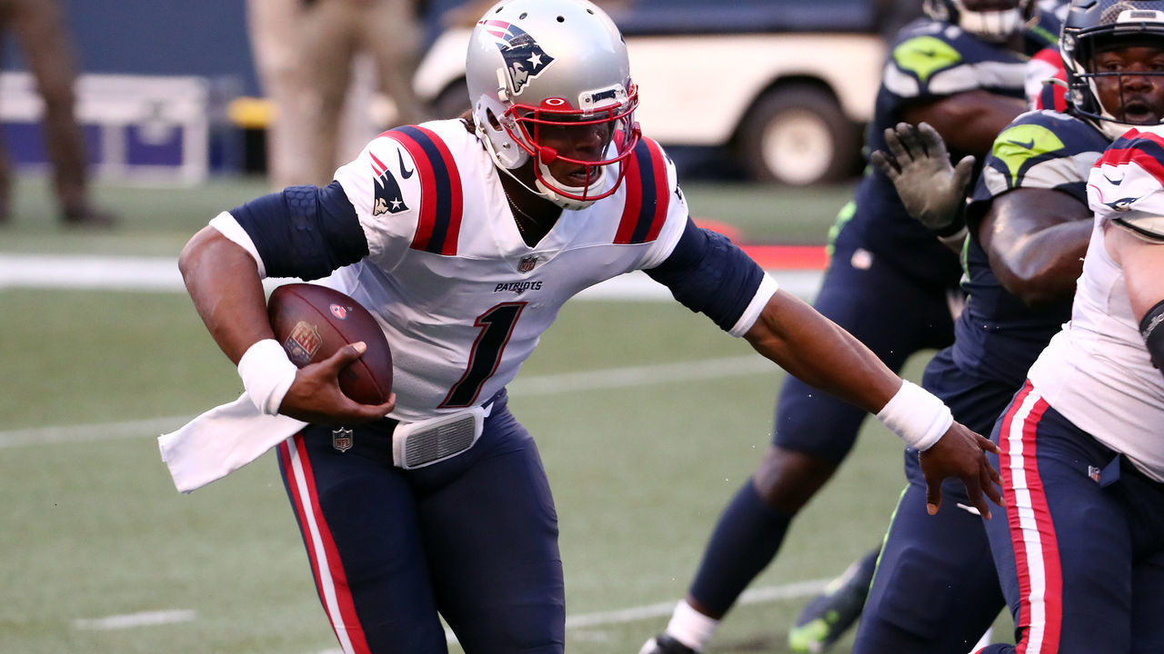 SEATTLE, WASHINGTON - SEPTEMBER 20: Cam Newton #1 of the New England Patriots runs with the ball during the first half against the Seattle Seahawks at CenturyLink Field on September 20, 2020 in Seattle, Washington.
