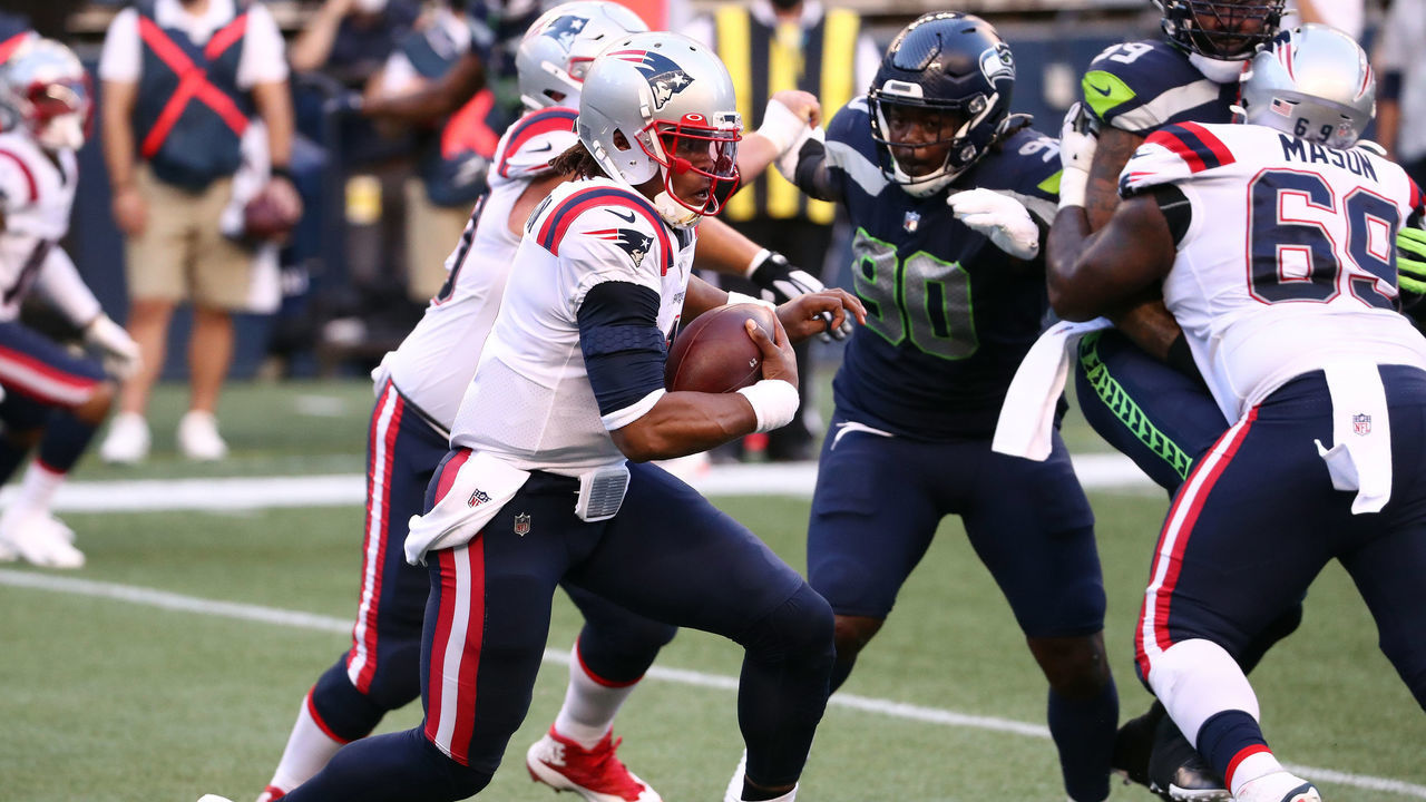 SEATTLE, WASHINGTON - SEPTEMBER 20: Cam Newton #1 of the New England Patriots runs with the ball in the second quarter against the Seattle Seahawks at CenturyLink Field on September 20, 2020 in Seattle, Washington.