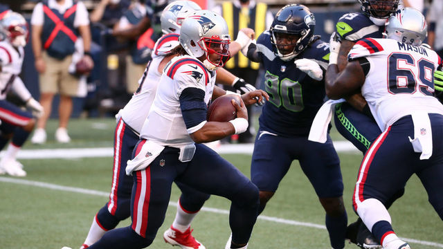 SEATTLE, WASHINGTON - SEPTEMBER 20: Cam Newton #1 of the New England Patriots runs with the ball in the second quarter against the Seattle Seahawks at CenturyLink Field on September 20, 2020 in Seattle, Washington.