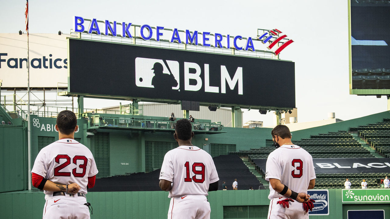 BOSTON, MA - JULY 24: Jackie Bradley Jr. #19 of the Boston Red Sox looks on during a Black Lives Matter and Players Alliance pre-game ceremony before the Opening Day game against the Baltimore Orioles on July 24, 2020 at Fenway Park in Boston, Massachusetts. The 2020 season had been postponed since March due to the COVID-19 pandemic.