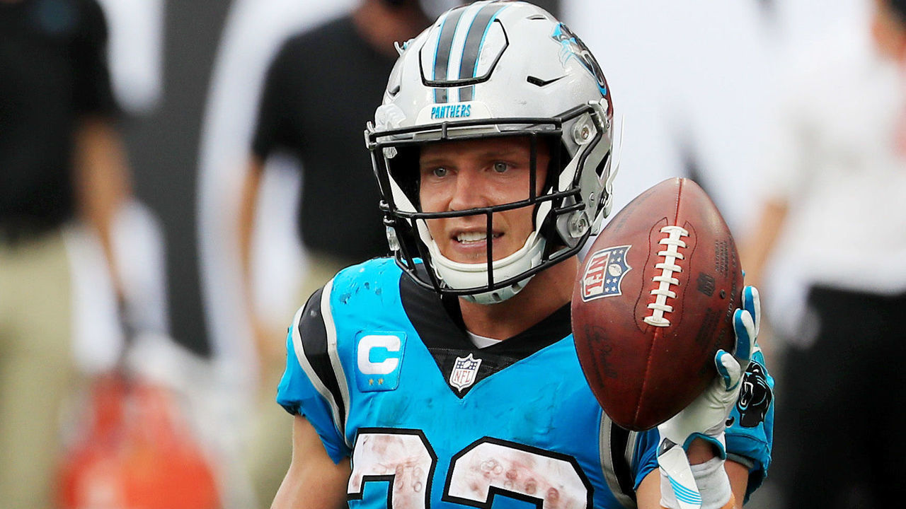 TAMPA, FLORIDA - SEPTEMBER 20: Christian McCaffrey #22 of the Carolina Panthers celebrates after scoring a touchdown during the third quarter against the Tampa Bay Buccaneers at Raymond James Stadium on September 20, 2020 in Tampa, Florida.