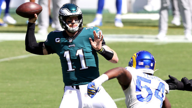 PHILADELPHIA, PENNSYLVANIA - SEPTEMBER 20: Quarterback Carson Wentz #11 of the Philadelphia Eagles throws a pass against the Los Angeles Rams at Lincoln Financial Field on September 20, 2020 in Philadelphia, Pennsylvania.