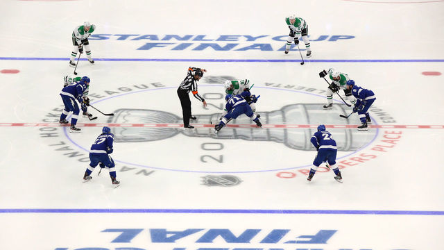 EDMONTON, ALBERTA - SEPTEMBER 19: A general view is seen of referee Francis Charron #6 dropping the puck during a center ice face-off between Tyler Seguin #91 of the Dallas Stars and Anthony Cirelli #71 of the Tampa Bay Lightning during the second period of Game One of the NHL Stanley Cup Final between the Dallas Stars and the Tampa Bay Lightning at Rogers Place on September 19, 2020 in Edmonton, Alberta, Canada.