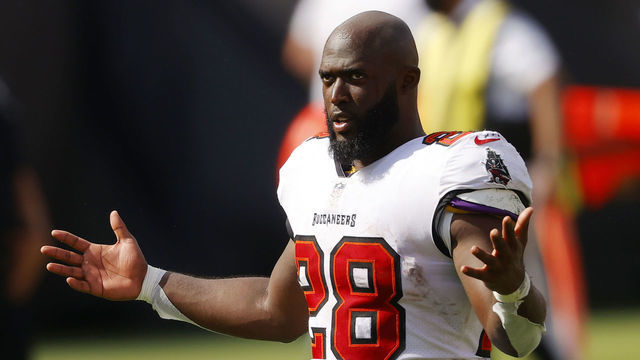 TAMPA, FLORIDA - SEPTEMBER 20: Leonard Fournette #28 of the Tampa Bay Buccaneers walks off the field after defeating the Carolina Panthers 31-17 at Raymond James Stadium on September 20, 2020 in Tampa, Florida.